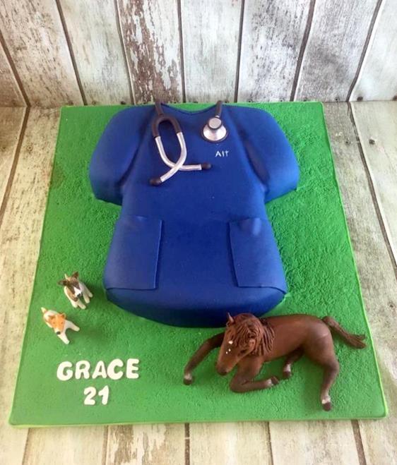 vets coat and animals birthday cake