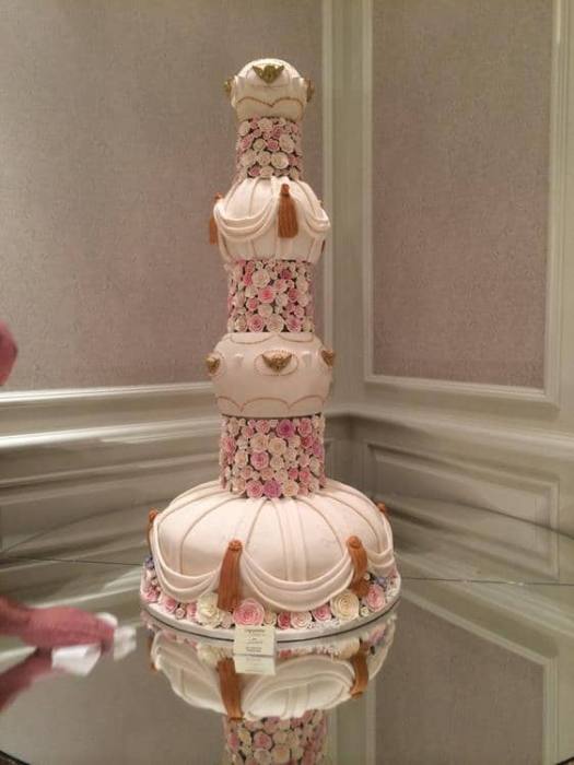 Extra large wedding cake in an Asian ball like appearance can