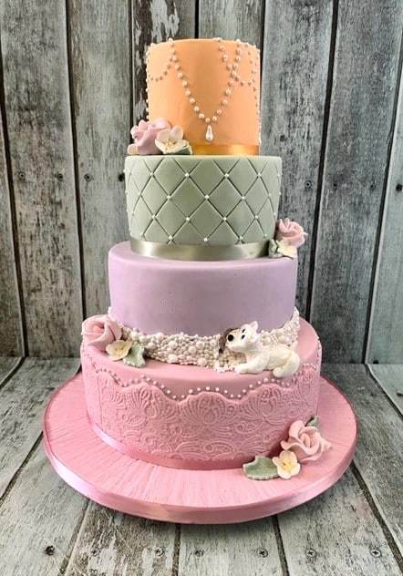 vintage-wedding-cake-with-dog-eating-into-ther-cake-