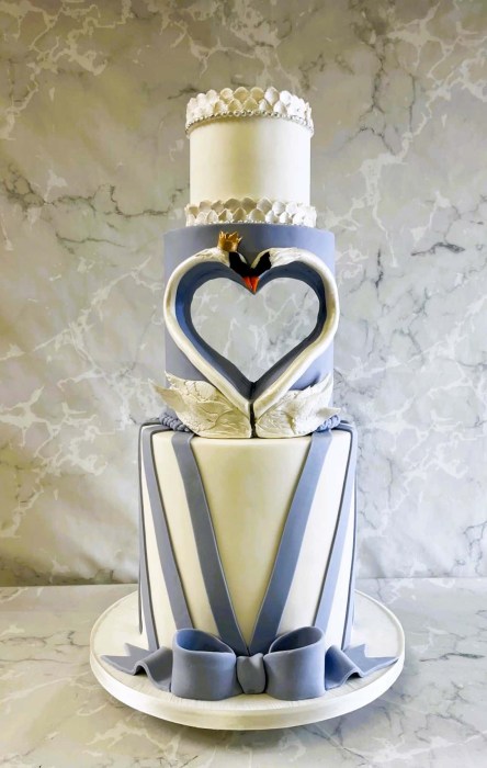 Hallow-Heart-swan-wedding-cake-withn-dramatic-stripes