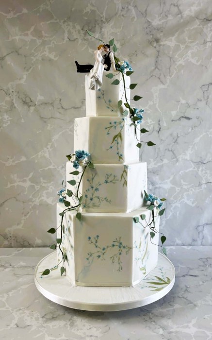 Hexagonal-delicate-hand-painted-blue-wedding-cake-