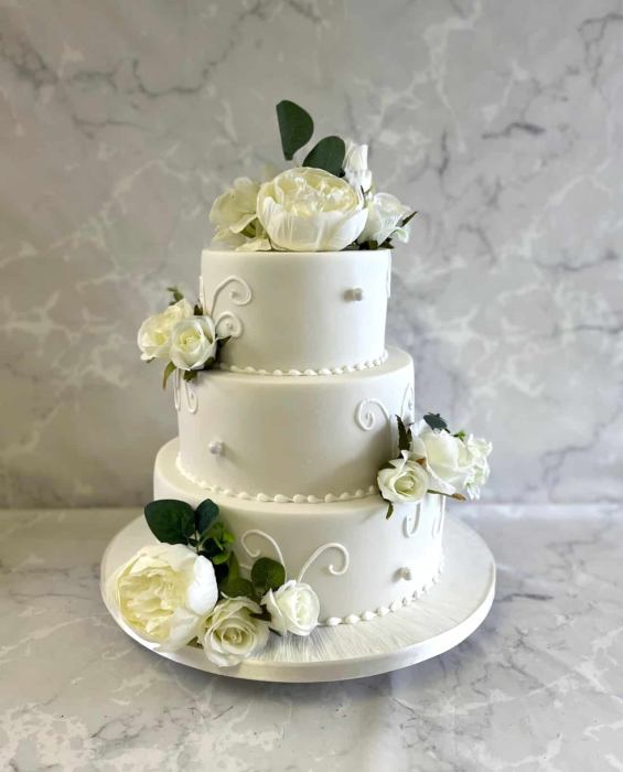 Royal Icing swirls wedding cake with silk