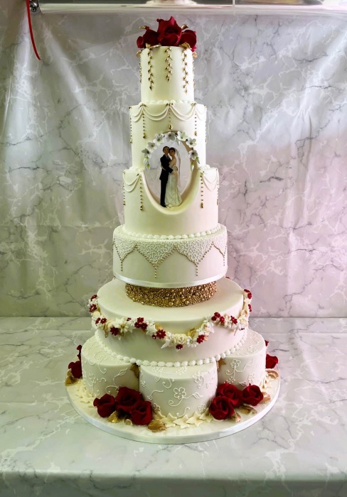 Large-wedding-cake-delicate-decoration-and-hollow-tier-