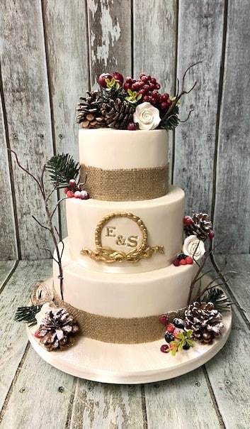 Rusic-winter-themed-wedding-cake-with-burlap-ribbon-