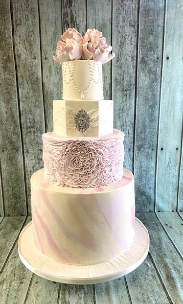 large-marbel-cake-with-delicate-ruffles